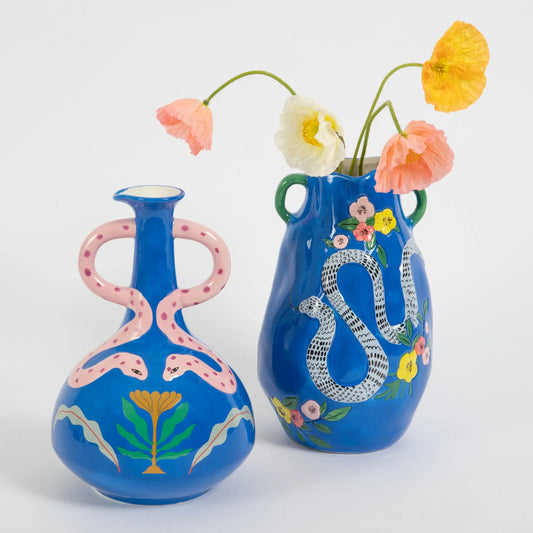 Styled image of Gigi&Tom blue ceramic glazed snake motif vases